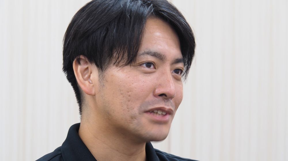 株式会社地域新聞社　テクノロジー統括部　統括部長　兼　情報システム部　部長　佐藤孝行氏